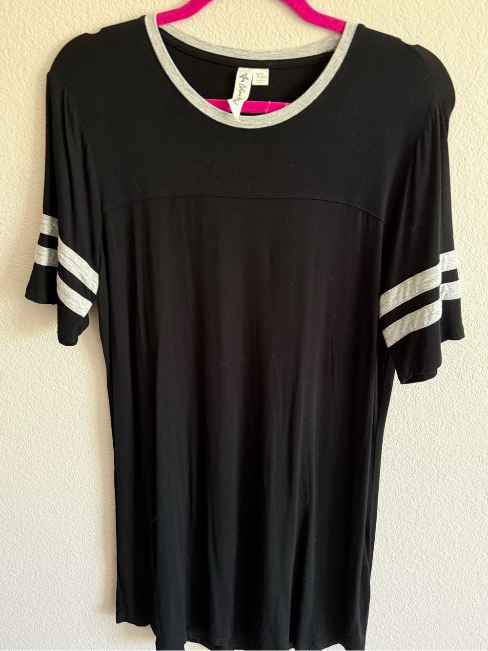 Others Follow Black Tee with Gray Trim and Pink Neck Band